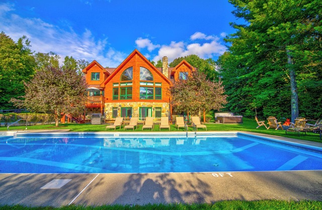 Most Luxurious 7000 Sq. ft. Log Estate — Pool, Hot Tub, Privacy & Lake Access!
