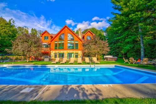 Most Luxury 7000 Sq ft Log Estate with Pool Hot Tub Sauna