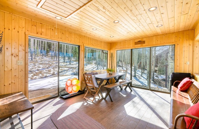 Mountain-view retreat on 200 acres with sunroom, wood stove & W/D - dog-friendly