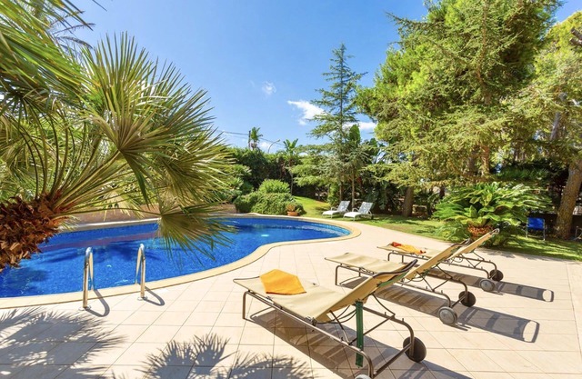 My Rental Homes - Villa Acquamarina with swimming pool surrounded by greenery