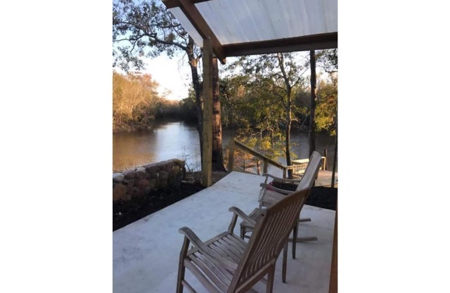 Naturalist Boudoir on POINT with Kayaks and SUP's