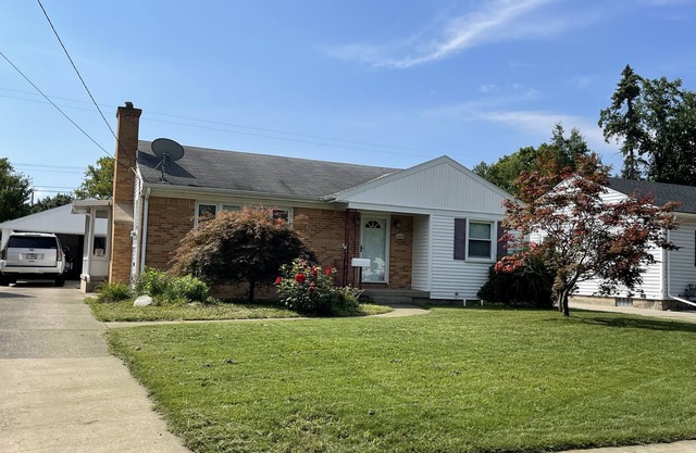 NE Executive Home close to all things Grand Rapids in highly desirable NE GR!