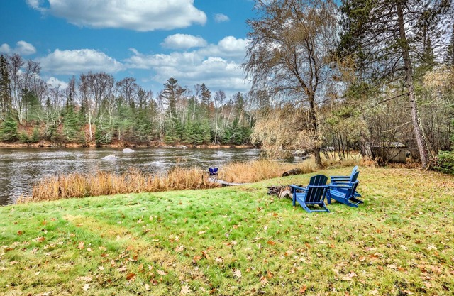 NEW! Adorable log cabin with picturesque river views!