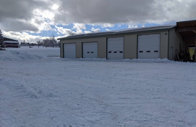 New apartment in shop with Indoor parking for toy trailers or vehicle.