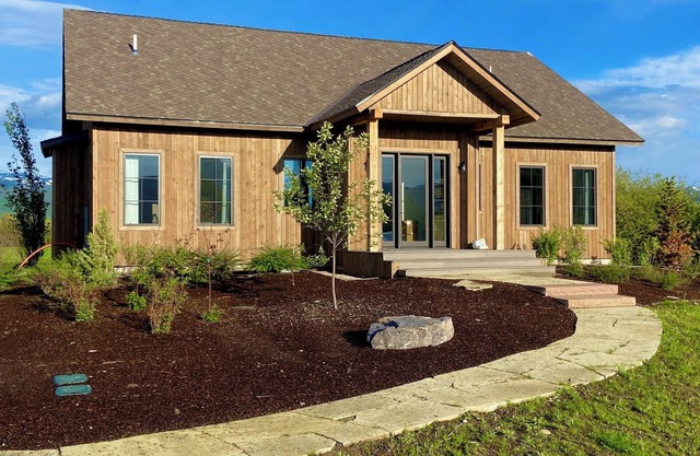 New Home on 28 Acres with rivers, wetlands, farm animals and Mt. Views!