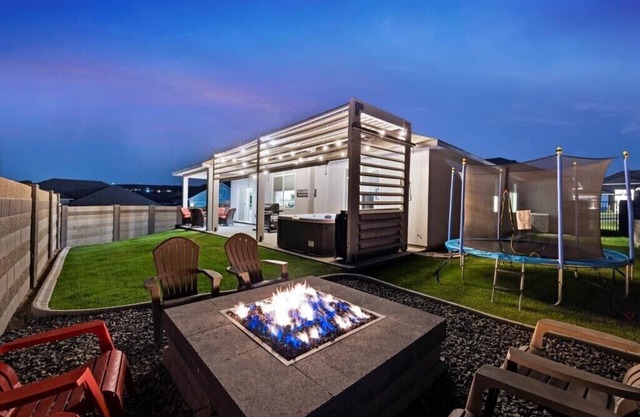 New house! Hot Tub and fire-pit waiting for you.