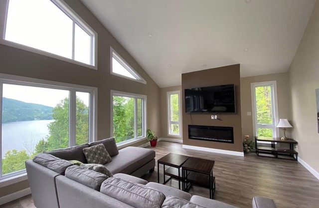 NEW! Lakefront Paradise: Spacious 5-Bedroom Retreat with Hot Tub Bliss