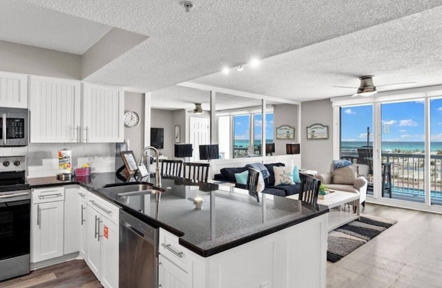 NEW Listing! BEACH FRONT with Amazing Ocean & Pool Views! 1st floor easy access!