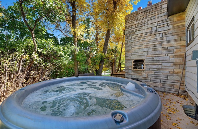 NEW LISTING! Charming Retreat w/ Hot Tub, Pizza Oven by RedAwning