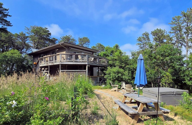 NEW LISTING! Indian Neck 3BD--A/C, Hot Tub, Fire Pit, Fox Island Marsh Views, Walk to Omaha Beach