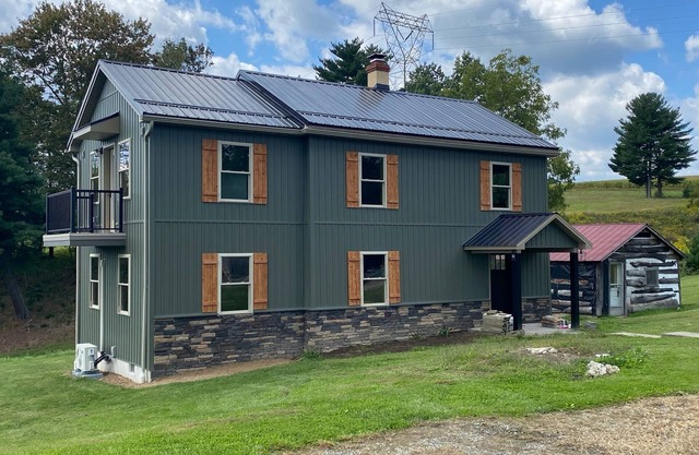 New Listing! Remodeled log farmhouse with lake view!
