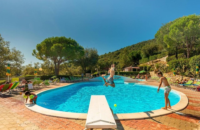 Neues Management Ferienhaus Villaggio Colombo V5 mit Terrasse & Gemeinschaftspool