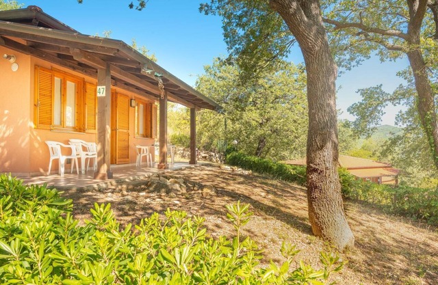 Neues Management Ferienhaus Villaggio Colombo V4 mit Garten & Gemeinschaftspool