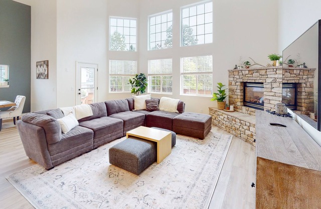 New remodeled forested 2-story home with large patio, W/D, fireplace, grill