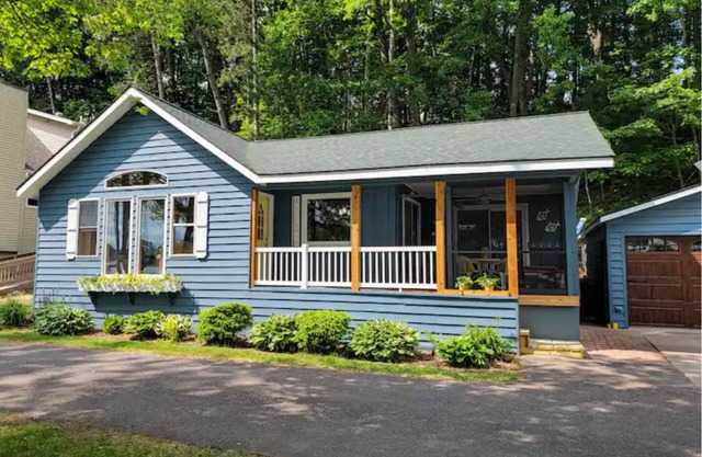 NEW! Renovated Bungalow steps from Lake Tomahawk - King Bed, Dock Space, Firepit