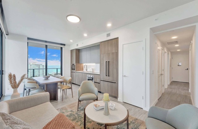 NEW: Stunning views 4 Bdrms Condo steps from the beach
