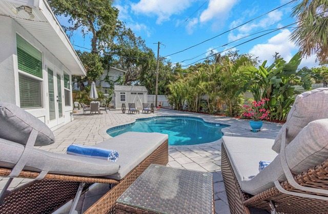 NEW! Tropical Paradise with Pool & Resort Style Backyard! 5 minutes to beach!