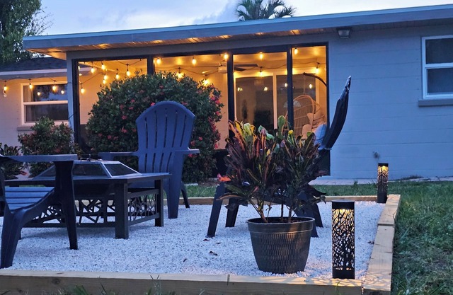 NEW! Tropical Retreat Cozy Patio ~3 miles to Beach Firepit Wi-Fi A/C