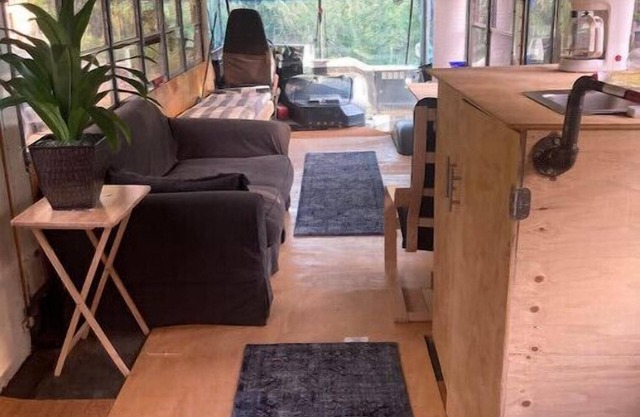 Newly converted 3-season bus. Outdoor shower.