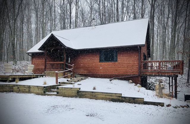 Newly offered Amazing cabin on 5 wooded acres - close to trails and town