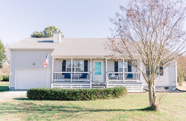 Newly renovated, 4BD 2 BA, 1 full acre, sleeps 9, and is pet friendly.