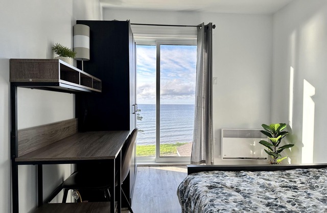 Newly Renovated Beach Home Steps Away from the Sea with 3 Bedrooms, queen beds.