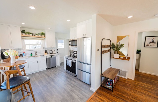 Newly Renovated 4 BR Home with Parking and 2 King Beds