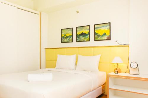 Nice and Elegant 1BR Apartment at Mustika Golf Residence By Travelio