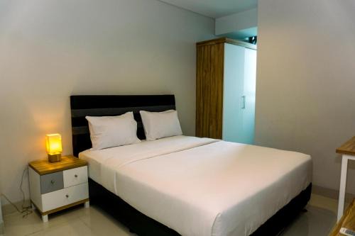 Nice and Elegant 2BR Apartment at Springhill Terrace Residence By Travelio