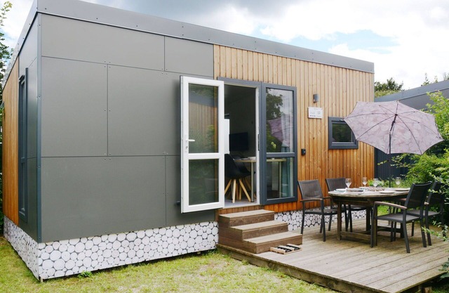 Schöne Wohnung in einem Ferienhaus mit W-LAN, TV, Terrasse, Haustiere erlaubt und Parkplatz