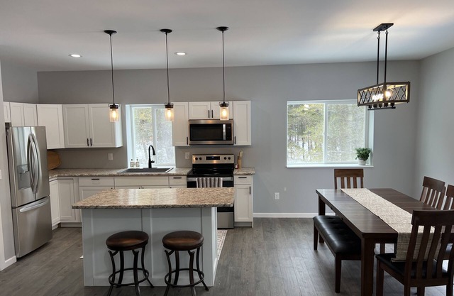 Nice family home on golf course and snowmobile/bike trail.