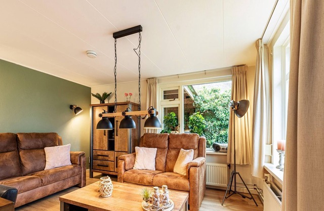 Nice holiday home in Emst with wellness and garden house