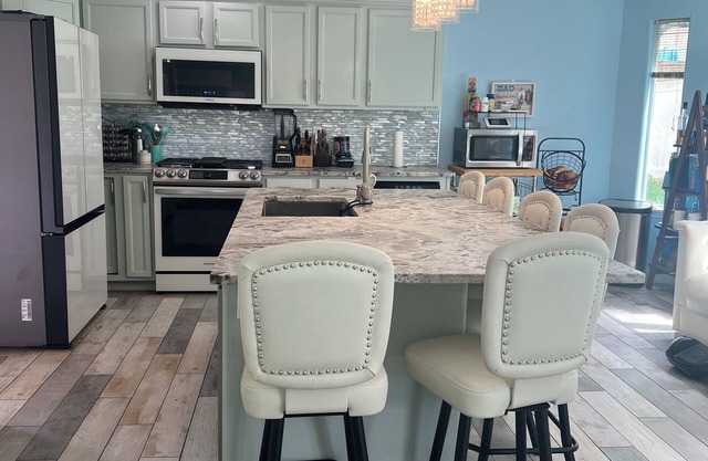 Nice home close to water with shared beach access.