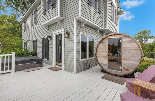 Oak Island: Waterfront Bliss with Hot Tub and Sandy Beach