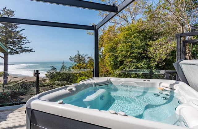 Ocean-view home & studio with hot tub, outdoor kitchen, fire table, wood stove