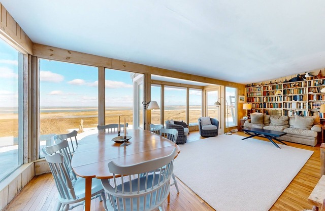 Ocean-view home with private beach, streaming, grill, outdoor shower, deck, & AC