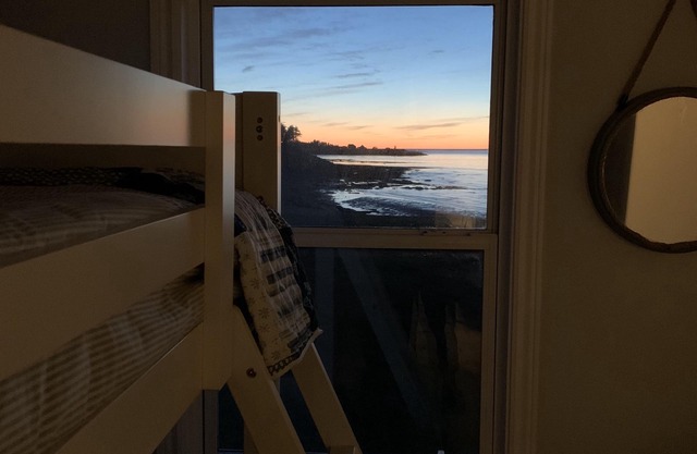 Oceanfront beach cottage panoramic views spectacular sunsets sandbars warm water