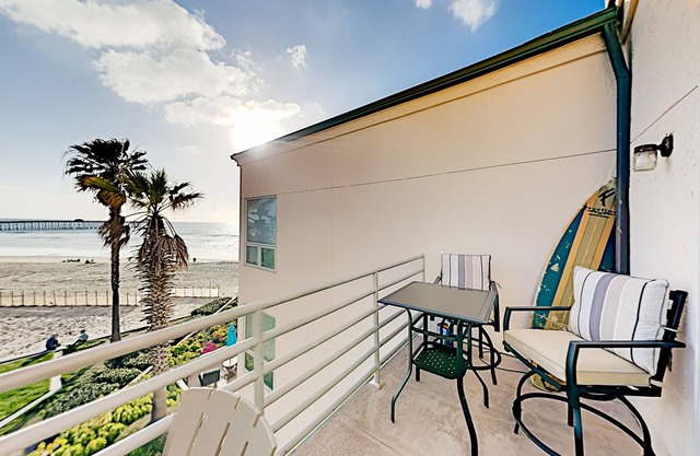 Oceanfront condo with direct beach access, pool, hot tub, & private balcony