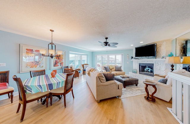 Oceanfront condo with scenic balconies, pool, beach gear, & W/D - dog-friendly