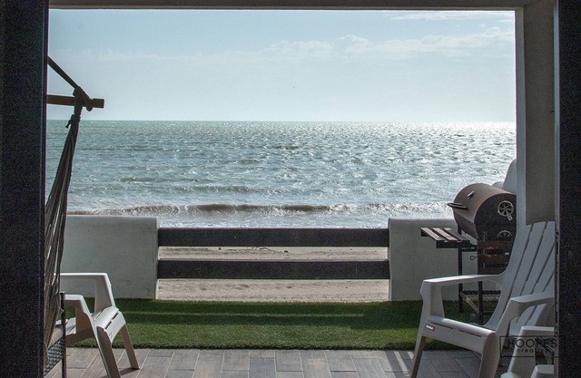 Oceanfront ground level condo on a Private Beach in a lovely resort!
