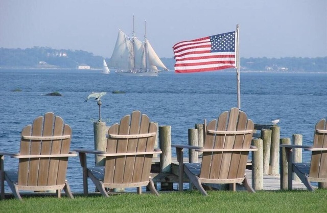 Oceanfront home with private dock & large yard