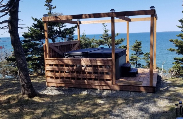 Oceanfront mini home with two decks and spectacular views.