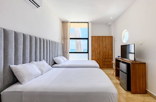 Oceanfront Studio with a Pool, WIFI, Central A/C, Great Location