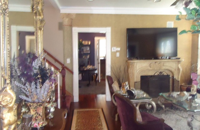 Old world Charm, with view of Fox River wrap around front porch .