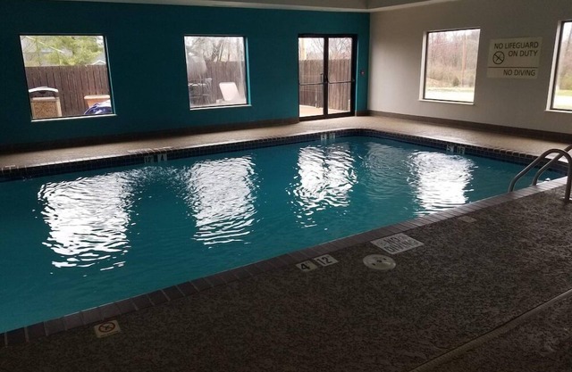 2 Connecting Suites with Three Beds at a Full Service Hotel by Suiteness