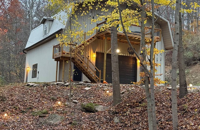 One of a kind 4-bedroom barndominium in Warsaw, Ohio on 23 wooded acres.