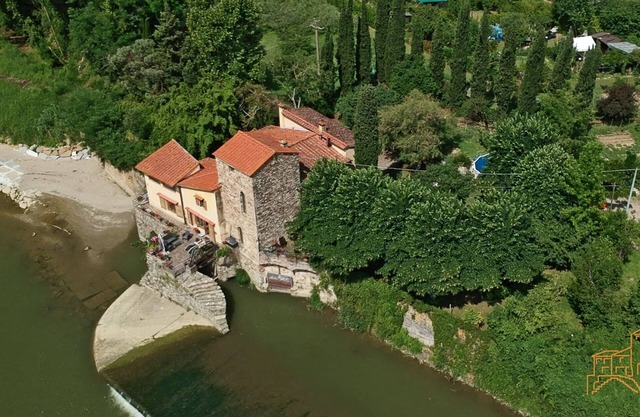 Ein romantisches B & B in einer alten Mühle aus dem 13. Jahrhundert am Fluss Arno in der Nähe von Florenz