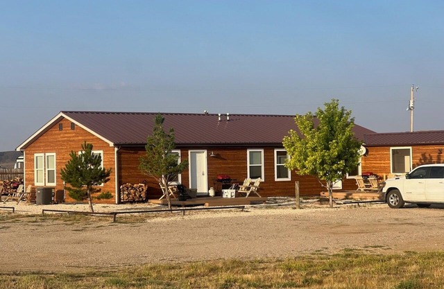 Open skies & breathtaking scenery from this 2-bdrm cabin deck.