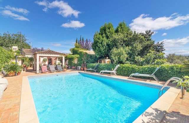 Own house on a 3 villa property with shared pool.