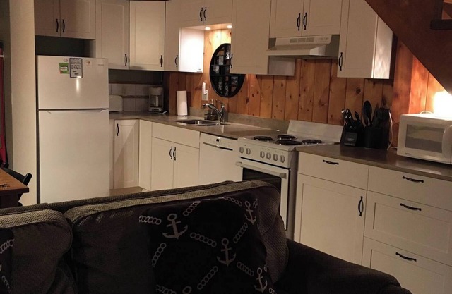 Pacific Rim Cabin Cozy waterfront cedar cabin with hot tub. Pet friendly!